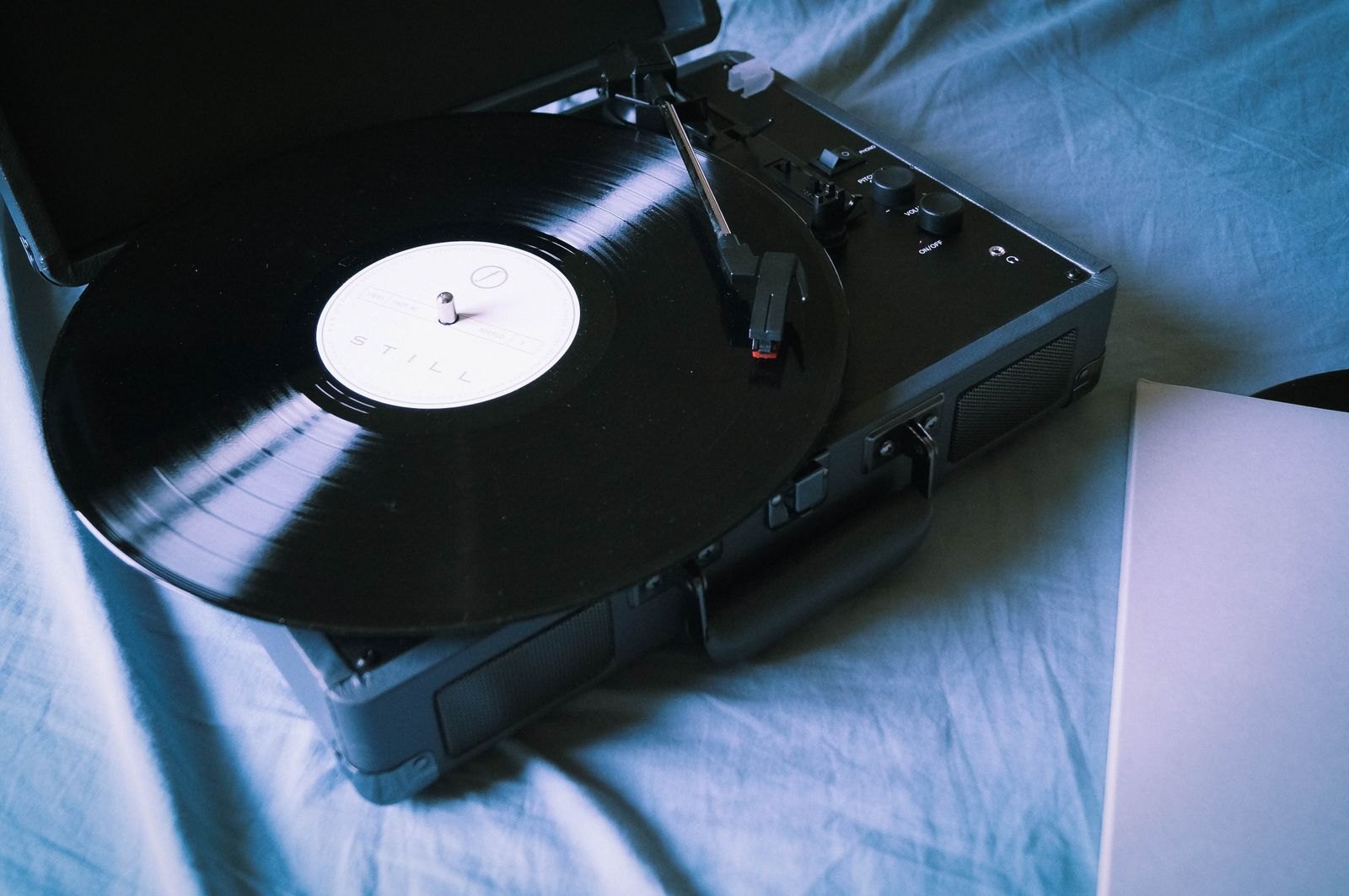 A vinyl record spinning on a turntable