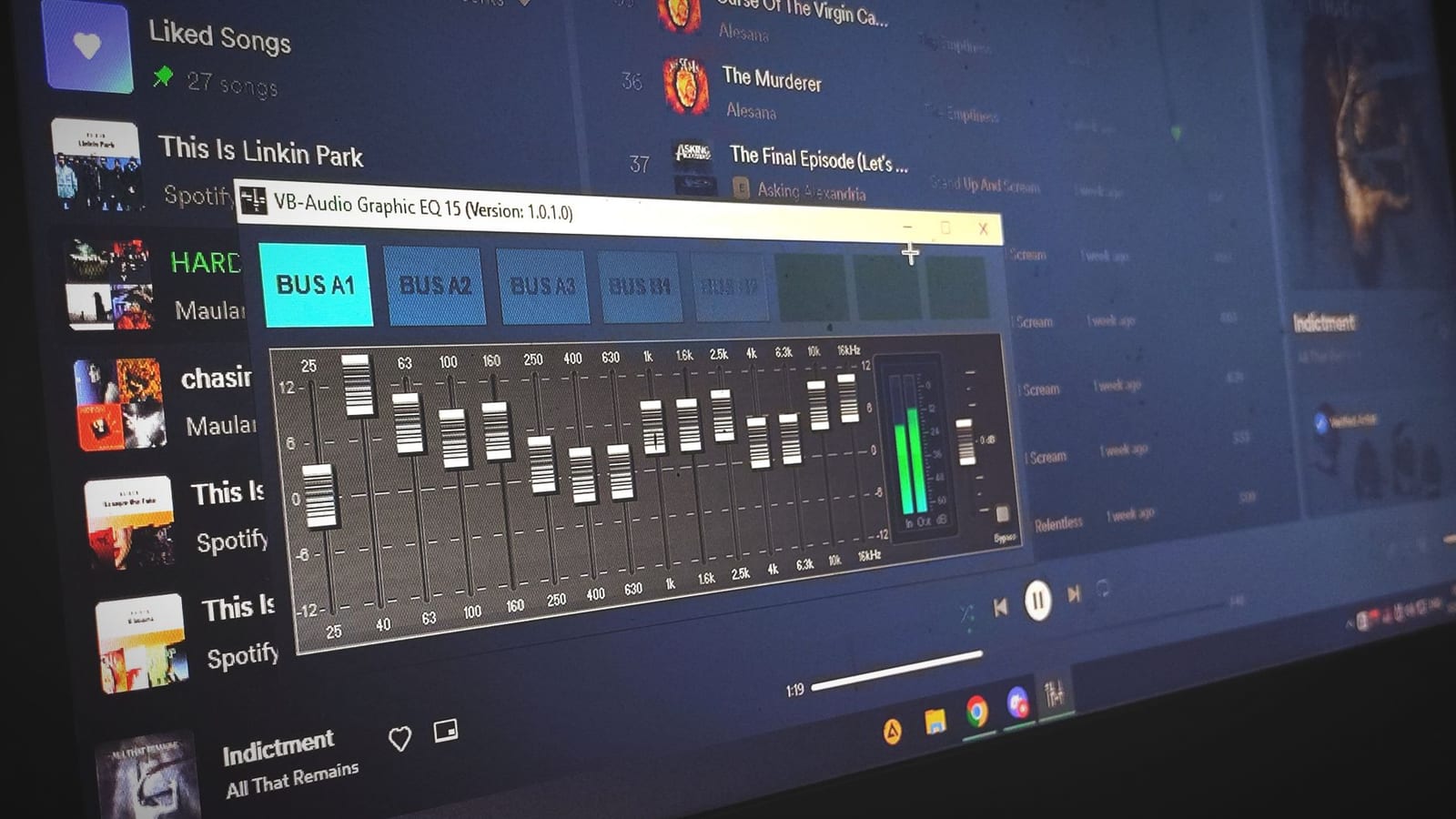 A graphic equalizer display on a laptop screen